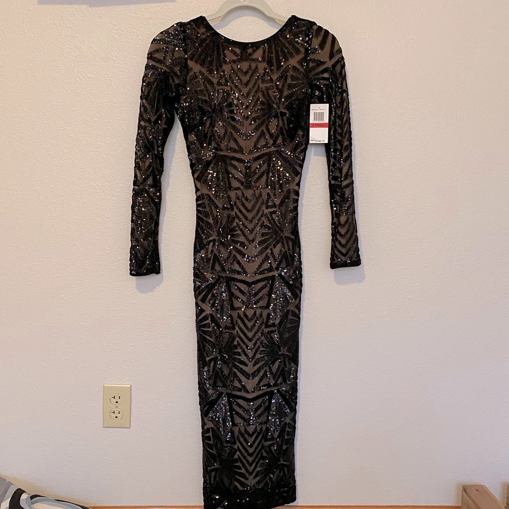 The perfect New Years Eve Dress. Sexy backless sequence dress.